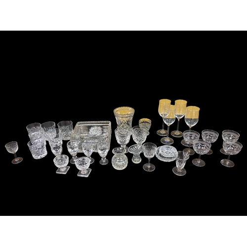 310 - A COLLECTION OF PLATED WARE to include a three piece plated coffee service, a plated entrée dish, a ... 