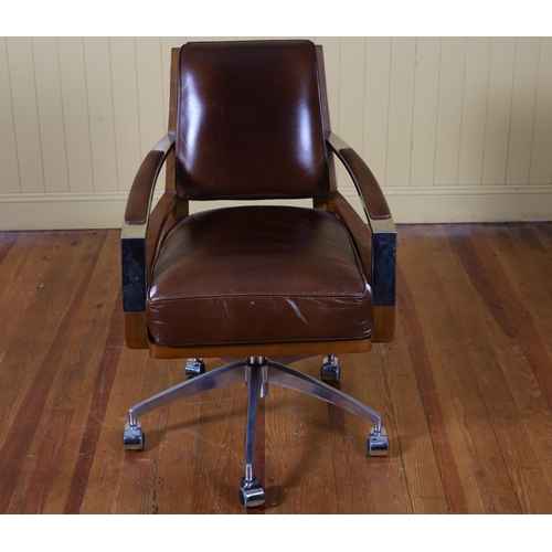 358 - AN AVIATION CHERRYWOOD CHROME AND HIDE UPHOLSTERED SWIVEL LIBRARY CHAIR the shaped panel back and se... 