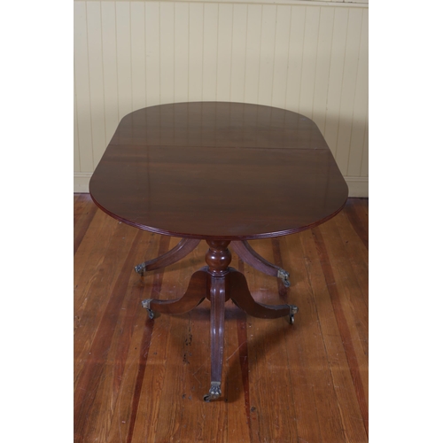 376 - A REGENCY STYLE MAHOGANY D-END DINING TABLE of rectangular outline with rounded ends and one loose l... 