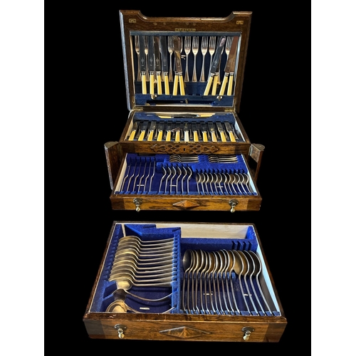 379 - A PART CANTEEN OF CUTLERY in oak two drawer chest with spiral twist pilasters on bun feet 26cm (h) x... 