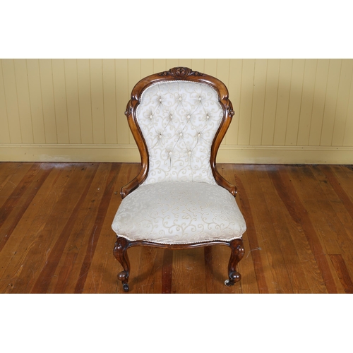 44 - A 19TH CENTURY CARVED MAHOGANY AND UPHOLSTERED LADY'S CHAIR the shaped top rail above a buttoned uph... 