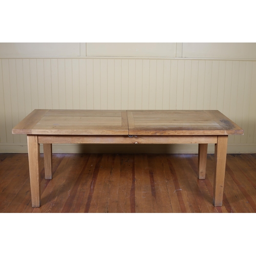 46 - AN OAK DRAW LEAF TABLE of rectangular outline with one loose leaf on square tapering legs 76cm (h) x... 