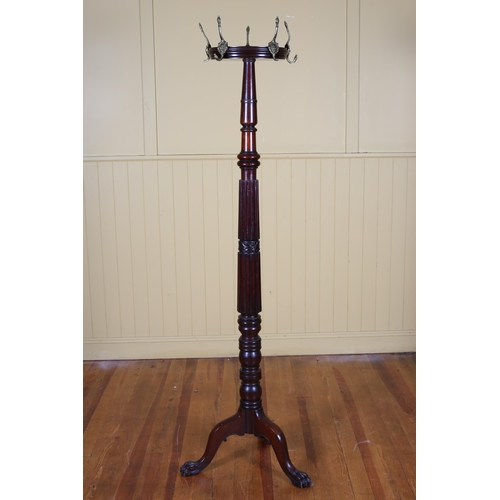 48 - A 19TH CENTURY MAHOGANY HAT AND COAT STAND the fluted and turned column with revolving top with five... 