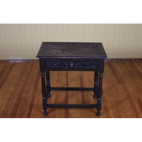 54 - A VINTAGE JACOBEAN STYLE OAK OCCASIONAL TABLE of rectangular outline the carved top above a frieze d... 