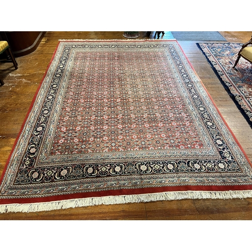 639 - A HERATI WOOL RUG the multicolour ground with central panel filled with palmettes, stylised flowerhe... 