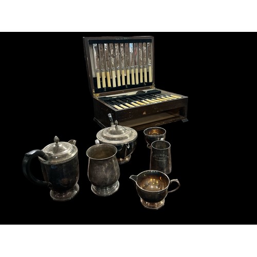 597 - A MISCELLANEOUS COLLECTION to include a four piece silver plated tea and coffee service, two plated ... 