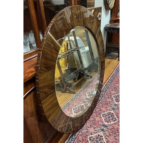 685 - A GIORGIO ROSEWOOD FRAME MIRROR the circular bevelled glass plate within a circular frame with brush... 