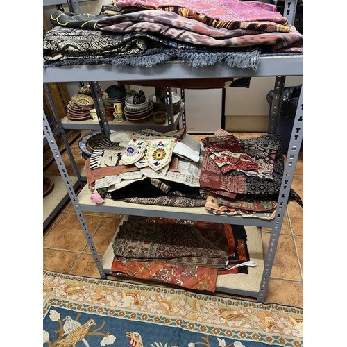 684 - A COLLECTION OF PRINTED COTTON , five Turkish cushions, a wool rug the blue and beige ground with ce... 