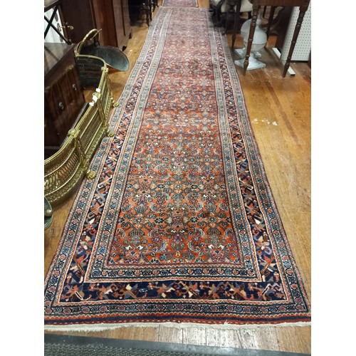 659 - A BIDJAR PERSIAN WOOL RUNNER Circa 1910 the wine indigo and light pink ground with central panels fi... 