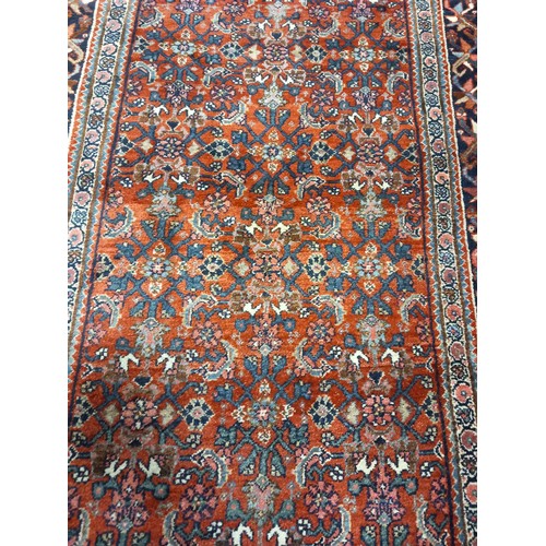 659 - A BIDJAR PERSIAN WOOL RUNNER Circa 1910 the wine indigo and light pink ground with central panels fi... 