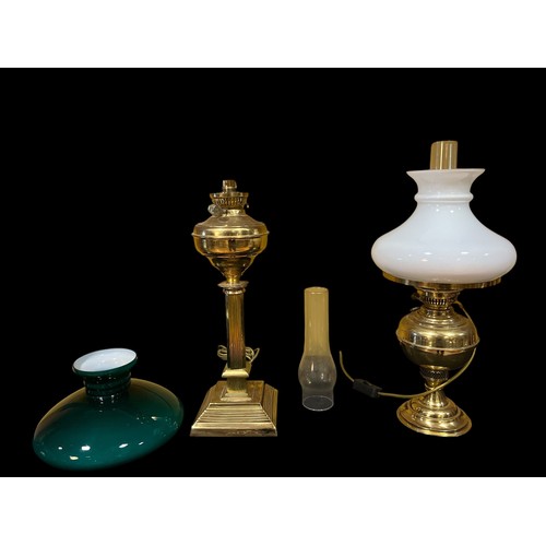 689 - TWO OIL LAMPS with shades