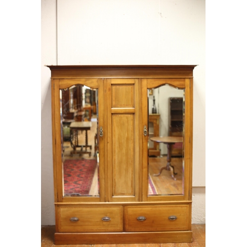 27 - A TWO PIECE EDWARDIAN MAHOGANY INLAID BEDROOM SUITE comprising A TWO DOOR WARDROBE with bevelled gla... 