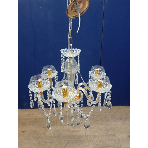 334 - A CONTINENTAL CUT GLASS SIX BRANCH CHANDELIER hung with faceted chains and pendant drops 100cm drop ... 