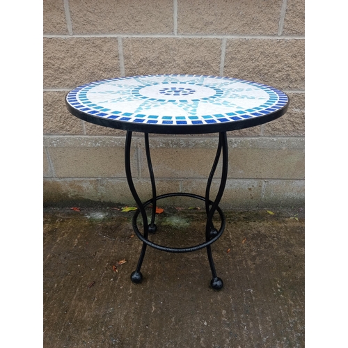 395 - A WROUGHT IRON AND MOSAIC PATIO TABLE of circular outline on splayed legs with spherical supports 71... 