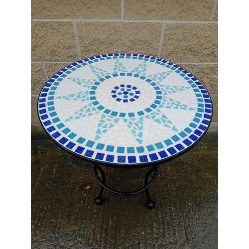 395 - A WROUGHT IRON AND MOSAIC PATIO TABLE of circular outline on splayed legs with spherical supports 71... 