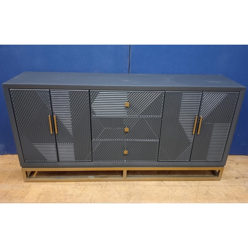 564 - A DESIGNER BLACK LACQUERED SIDEBOARD of octagonal outline the shaped top above three graduated friez... 