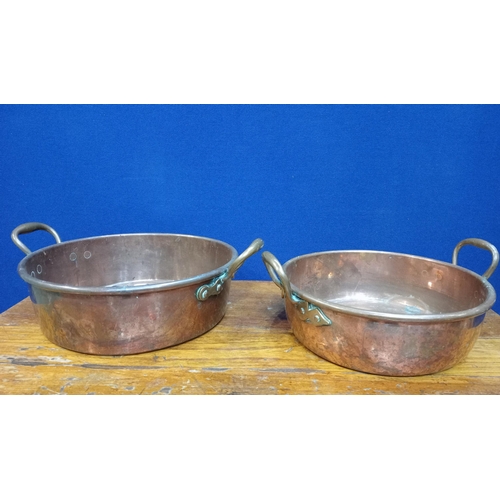 501 - TWO 19TH CENTURY COPPER AND BRASS PRESERVING PANS each of cylindrical form with pierced handles