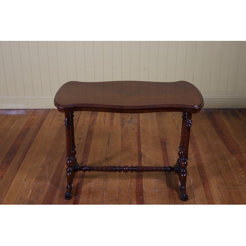 251 - A 19TH CENTURY MAHOGANY OCCASIONAL TABLE of serpentine outline the shaped top raised on dual turned ... 