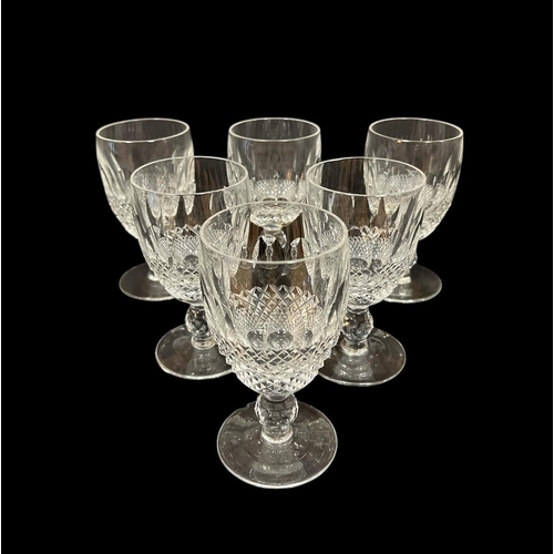 255 - A SET OF SIX WATERFORD CUT GLASS WINE GLASSES