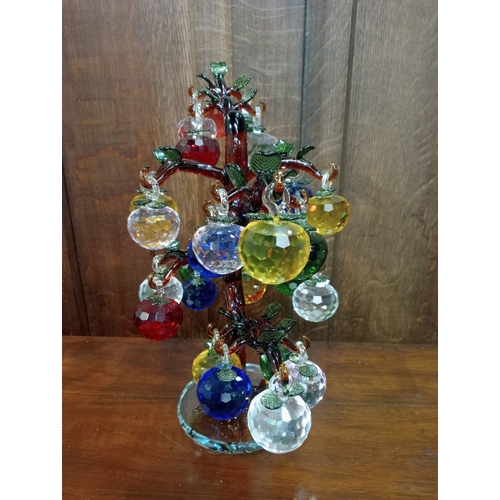 269 - A MULTICOLOURED GLASS TREE with faceted drops raised on a circular foot 42cm (h) 38cm (w) 20cm (d)