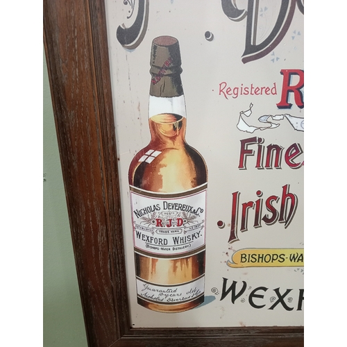 296 - A TIN PLATE ADVERTISING SIGN inscribed 'Nicholas Devereaux & Co. Fine Irish Whiskey Wexford' 84cm (h... 