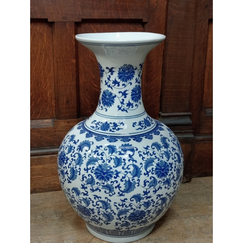 355 - A PAIR OF ORIENTAL BLUE AND WHITE VASES each of bulbous form the white ground decorated overall with... 