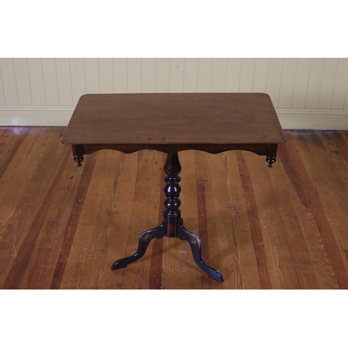 411 - A 19TH CENTURY MAHOGANY OCCASIONAL TABLE the rectangular moulded top with rounded corners on baluste... 