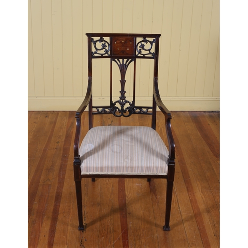 420 - AN EDWARDIAN CARVED MAHOGANY AND MARQUETRY ARMCHAIR the shaped top rail with pierced foliate carving... 