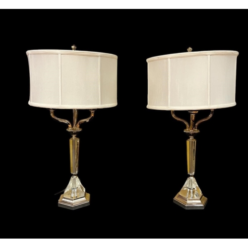 431 - A PAIR OF METAL AND CLEAR GLASS THREE BRANCH TABLE LAMPS with an octagonal shaped spreading column o... 