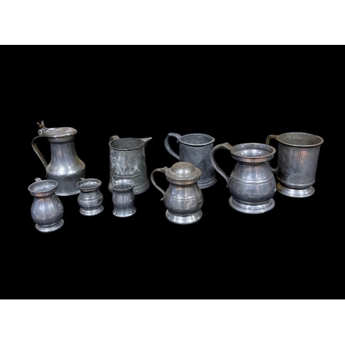 436 - A COLLECTION OF 19TH CENTURY AND LATER VINTAGE PEWTER to include five tankards, two lidded, three me... 