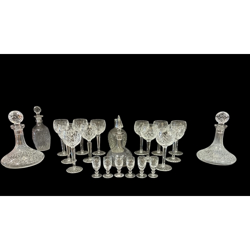 448 - TWELVE CUT GLASS WINE GOBLETS, a pair of cut glass ships decanters, a set of six cut glass port glas... 