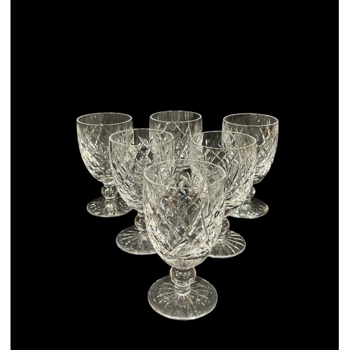 483 - A SET OF SIX WATERFORD CUT GLASS WINE GLASSES