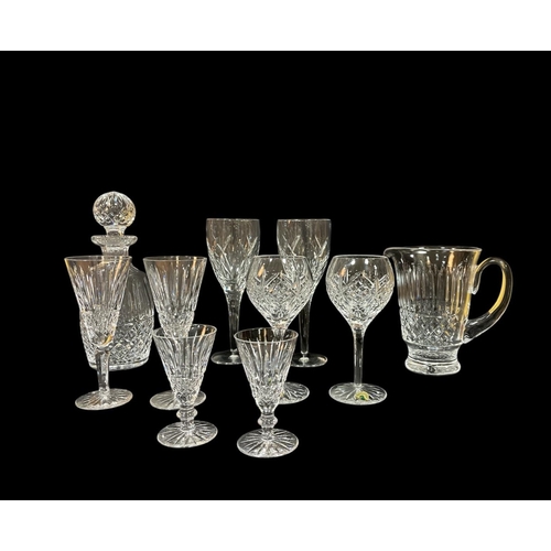 485 - A WATERFORD CUT GLASS WATER JUG, a pair of Waterford John Rocha wine glasses, a spirit decanter with... 