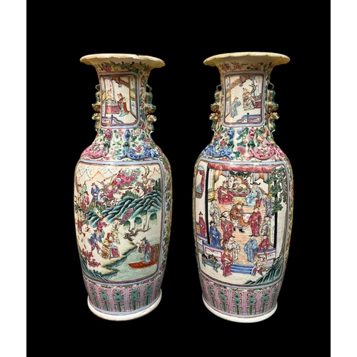 488 - A PAIR OF CHINESE FAMILLE ROSE VASES each decorated overall with figures, lizards and butterflies am... 