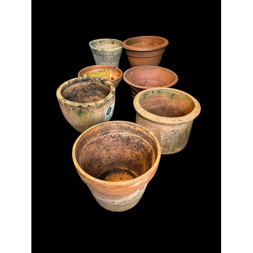 591 - A COLLECTION OF SEVEN TERRACOTTA PLANTERS various sizes