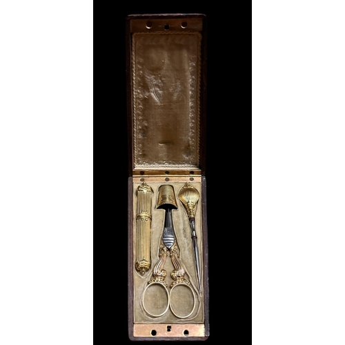 613 - A VICTORIAN FOUR PIECE SEWING SET in a hardwood inlaid case