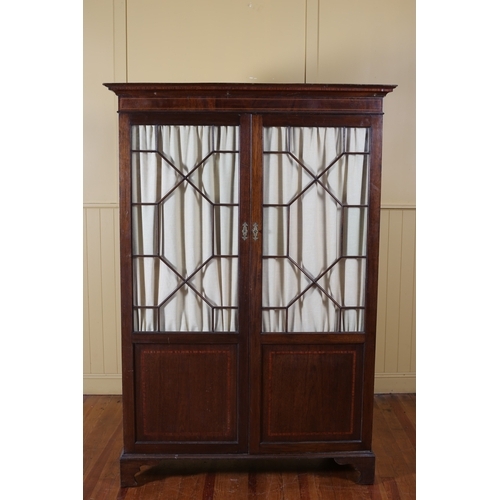 402 - A 19TH CENTURY MAHOGANY AND SATINWOOD INLAID WARDROBE the moulded cornice above a pair of astragal g... 