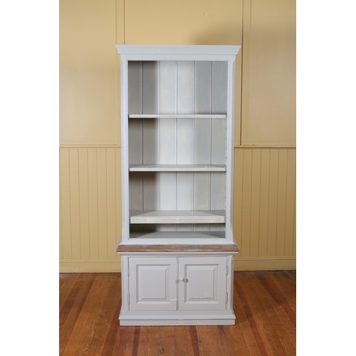 571 - A PINE AND GREY PAINTED OPEN FRONT BOOK SHELF the moulded cornice above five open shelves, four adju... 