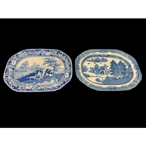 622 - A BLUE AND WHITE MEAT PLATTER decorated with figures on a riverbank 50cm (w) x 39cm (d) together wit... 