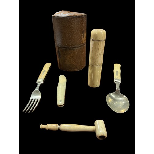 525 - A CAMPAIGN CUTLERY SET in leather case