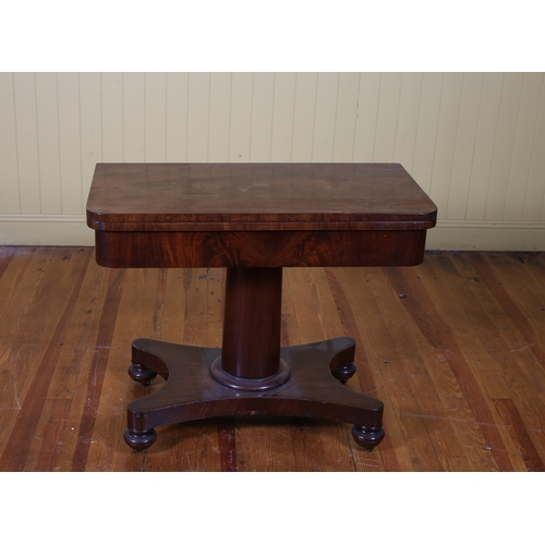 92 - A 19TH CENTURY MAHOGANY FOLDOVER SUPPER TABLE the rectangular hinged top above a cylindrical column ... 