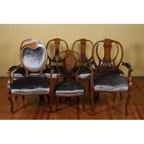 259 - A SET OF FOUR EDWARDIAN MAHOGANY AND SATINWOOD INLAID SIDE CHAIRS each with an oval moulded back wit... 