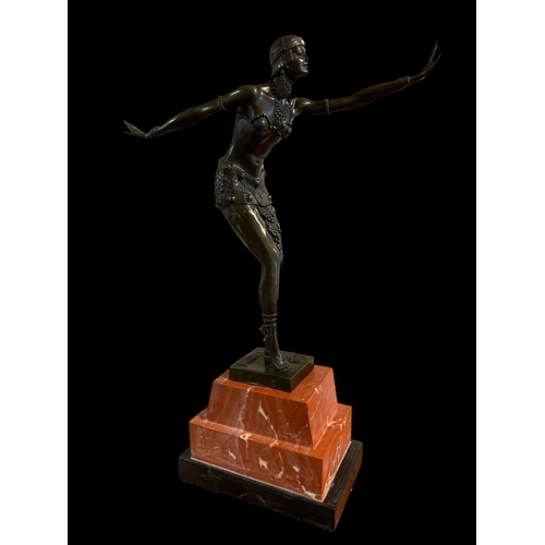 316 - after DEMETRE CHIPARUS An Art Deco style bronze figure modelled as a dancing female shown standing w... 