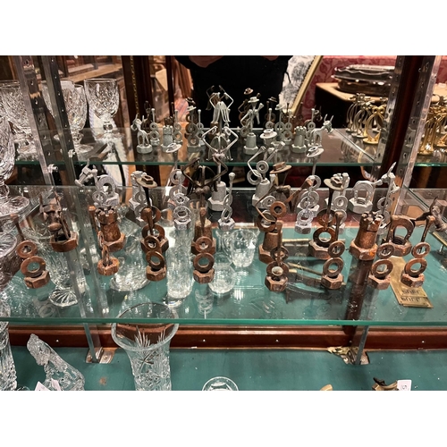 502 - A THIRTY TWO PIECE METAL HARDWARE CHESS SET