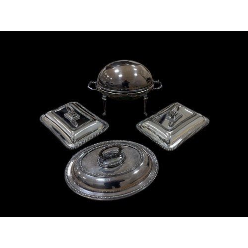 507 - A SILVER PLATED TWO HANDLED SERVING TRAY of oval outline together with A SHEFFIELD PLATED AND COPPER... 