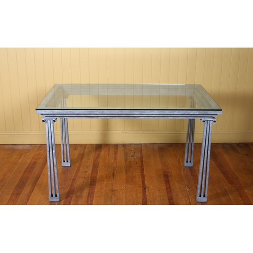 19 - AN ALFRANK TABLE of rectangular outline the shaped glazed top raised on pierced spreading legs with ... 