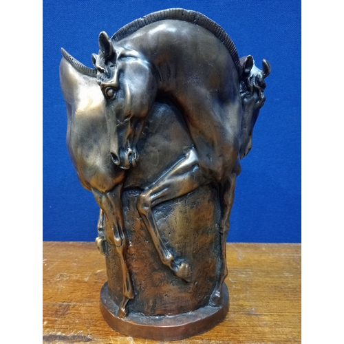 213 - A BRONZE FOUR STALLION CENTRE PIECE VASE 25cm (h) x 20cm (d)