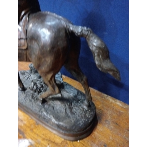 214 - after STEPHEN BEYER a bronze figure modelled as a Huntsman on horseback shown standing on a naturali... 