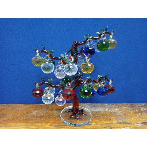 232 - A MULTICOLOURED GLASS TREE with faceted drops raised on a circular foot  41cm (h) x 36cm (w)