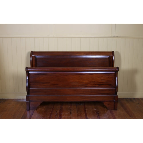 253 - A CHERRYWOOD SLEIGH BED of typical form with side rails and slats 101cm (h) x 160cm (l) x 229cm (w)